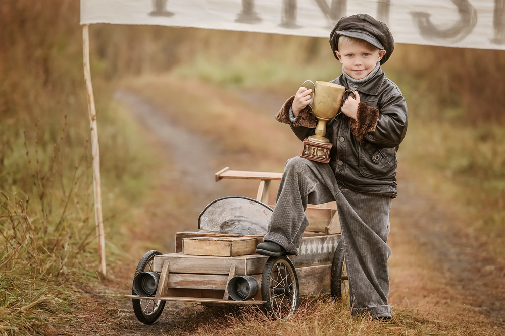 little boy wins cart race