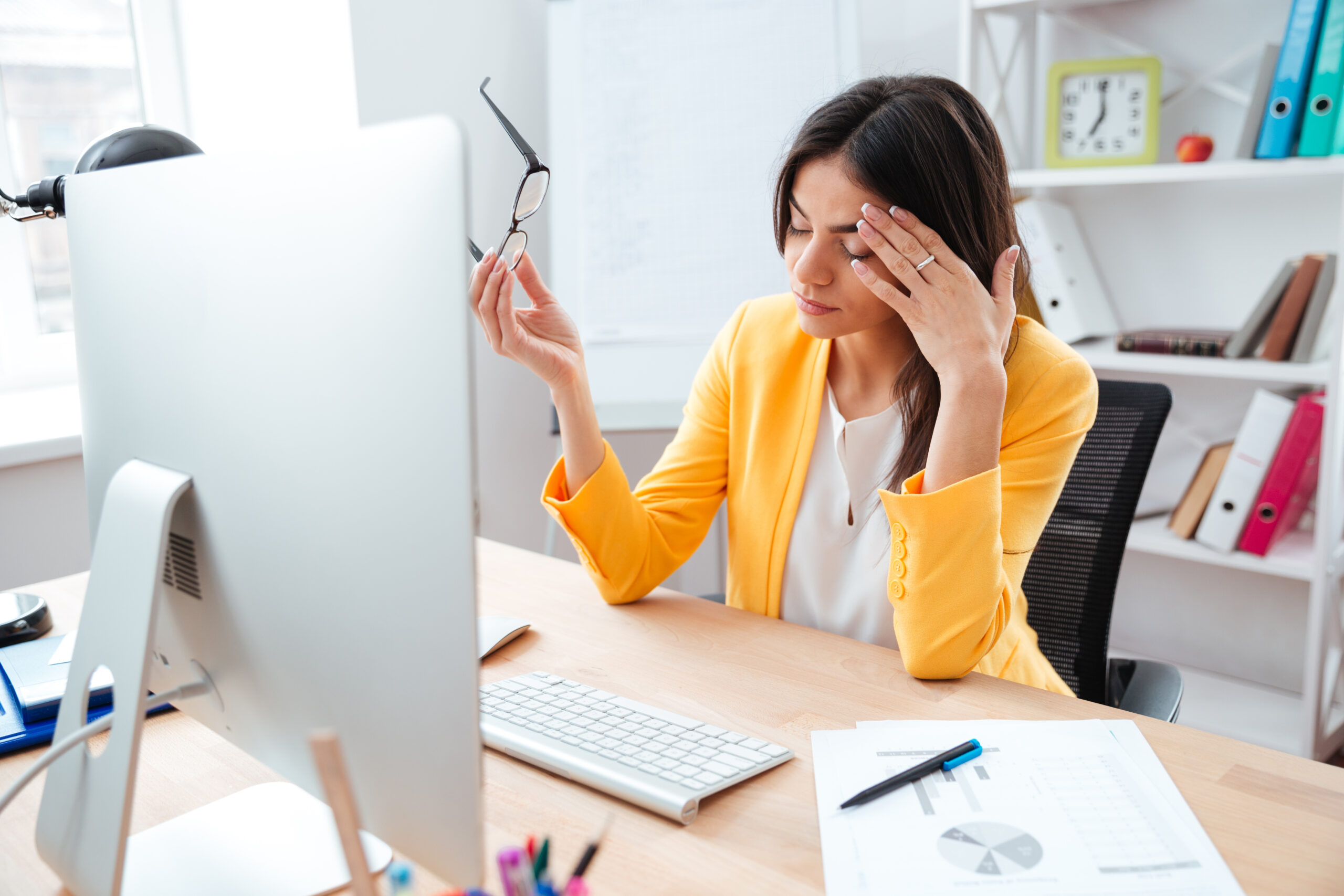 Businesswoman having head pain